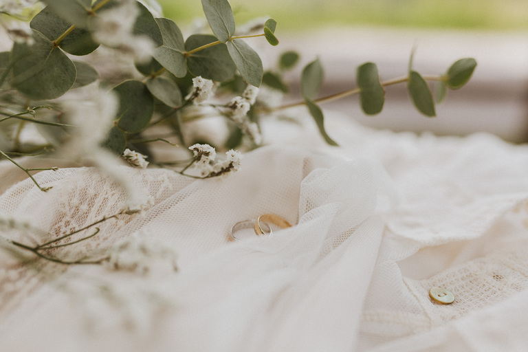 wedding dress and wedding ring detail 