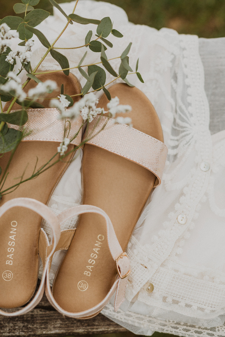 wedding shoes on a lace veil 